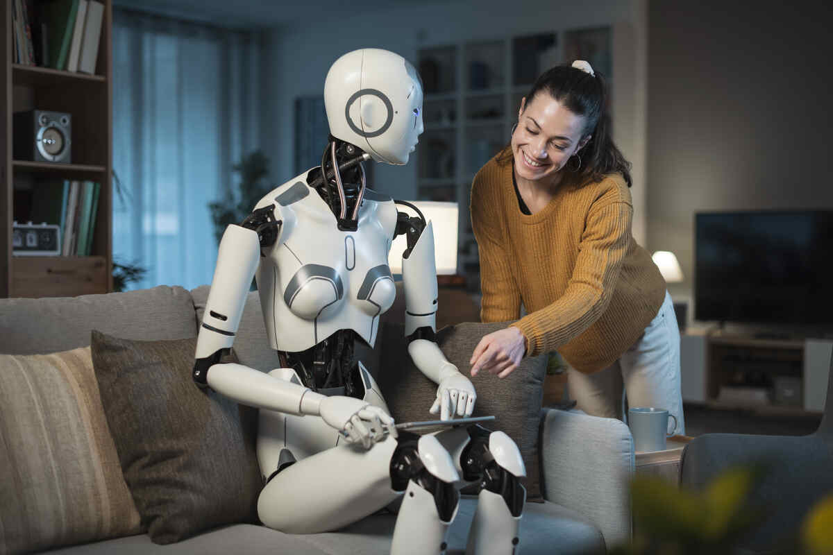 a young woman is teaching her AI robot